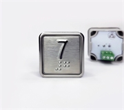 Кнопка приказа квадратная. Cимвол: 7-й этаж; код Брайля: имеется; материалы: нержавеющая сталь, алюминий, пластик; подсветка: красная; установочное место: 32,5 мм.