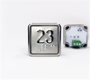 Кнопка приказа квадратная. Cимвол: 23-й этаж; код Брайля: имеется; материалы: нержавеющая сталь, алюминий, пластик; подсветка: красная; установочное место: 32,5 мм.